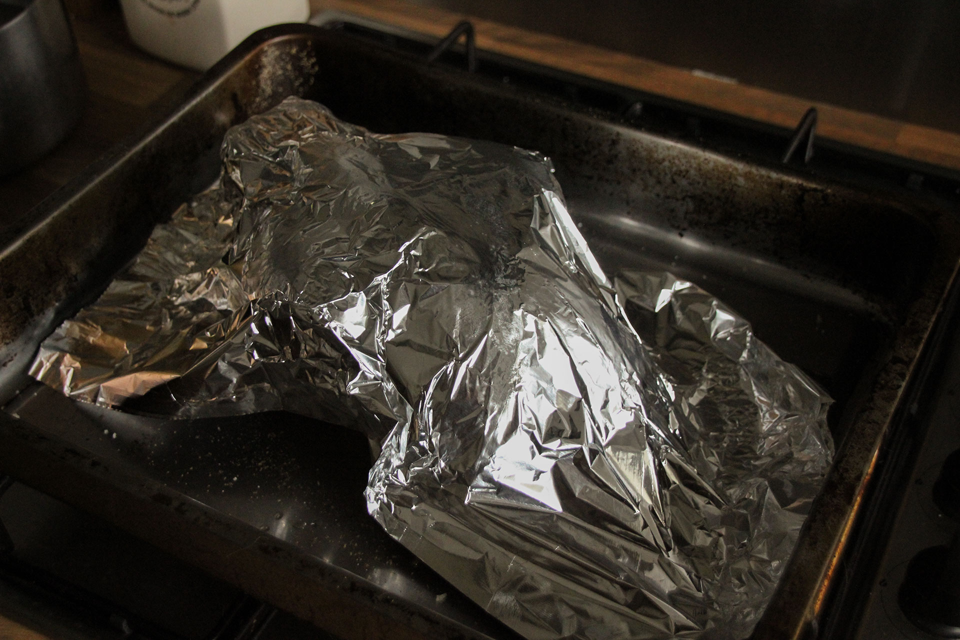 Chicken covered with tin foil