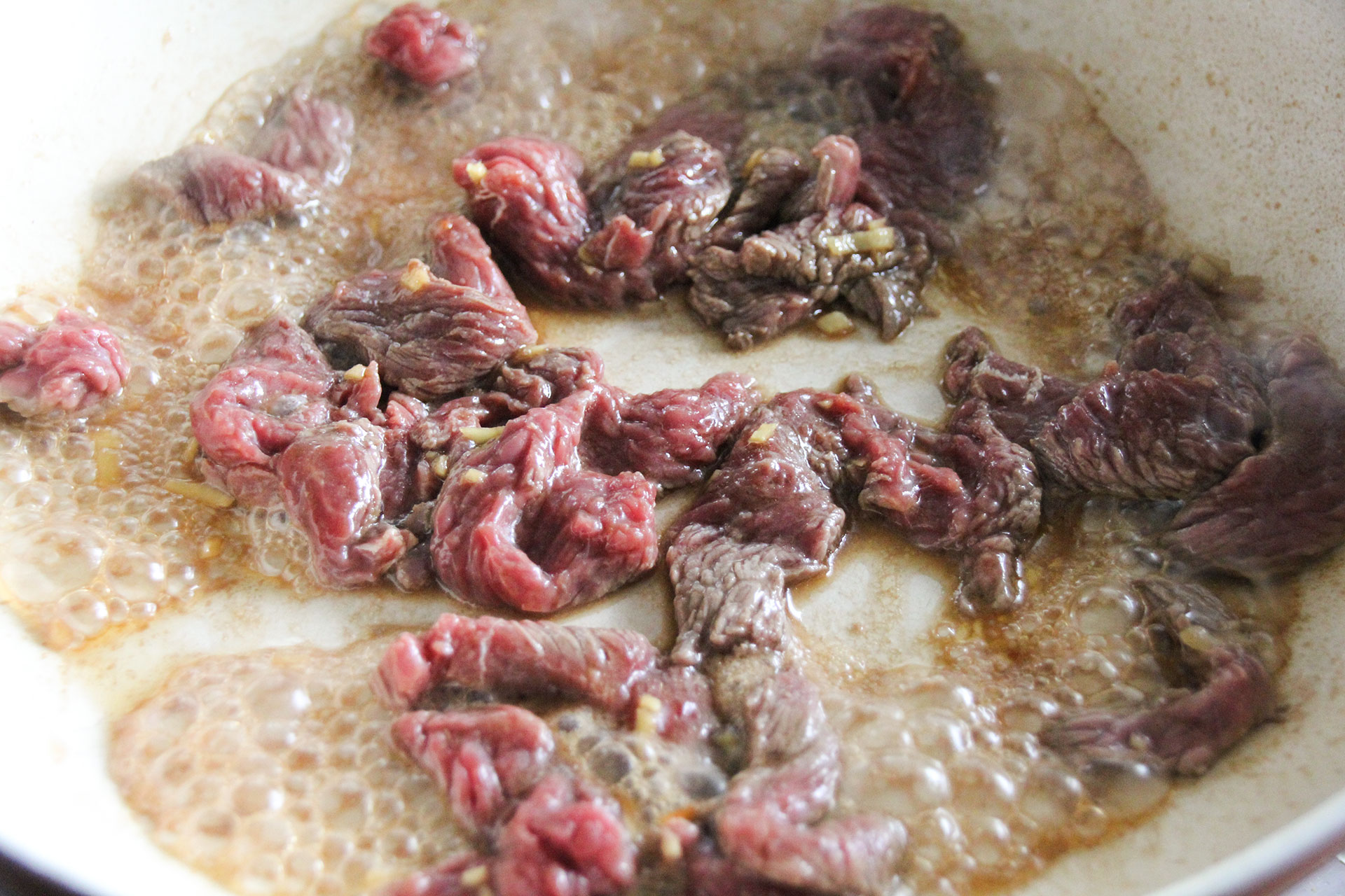 Thin strips of Steak Frying